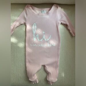 “Hi I’m new here” onesie. Used once.